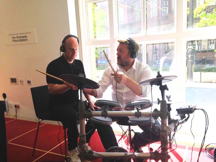 Philip Selway (Radiohead) with Guy Garvey (Elbow) at Manchester Library with drum kit donated in memory of Scott Johnson