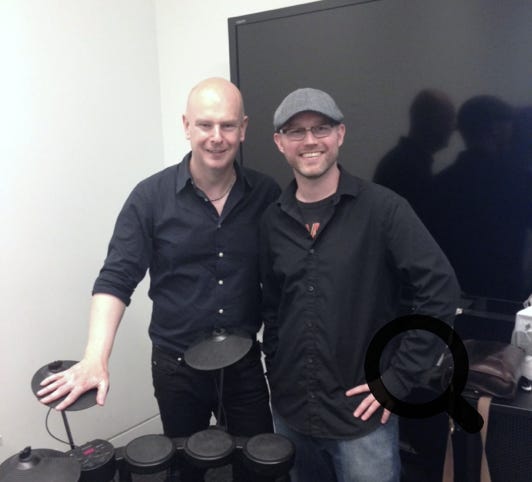 Philip Selway and David Porteous behind the drum kit Porteous donated in memory of Scott Johnson