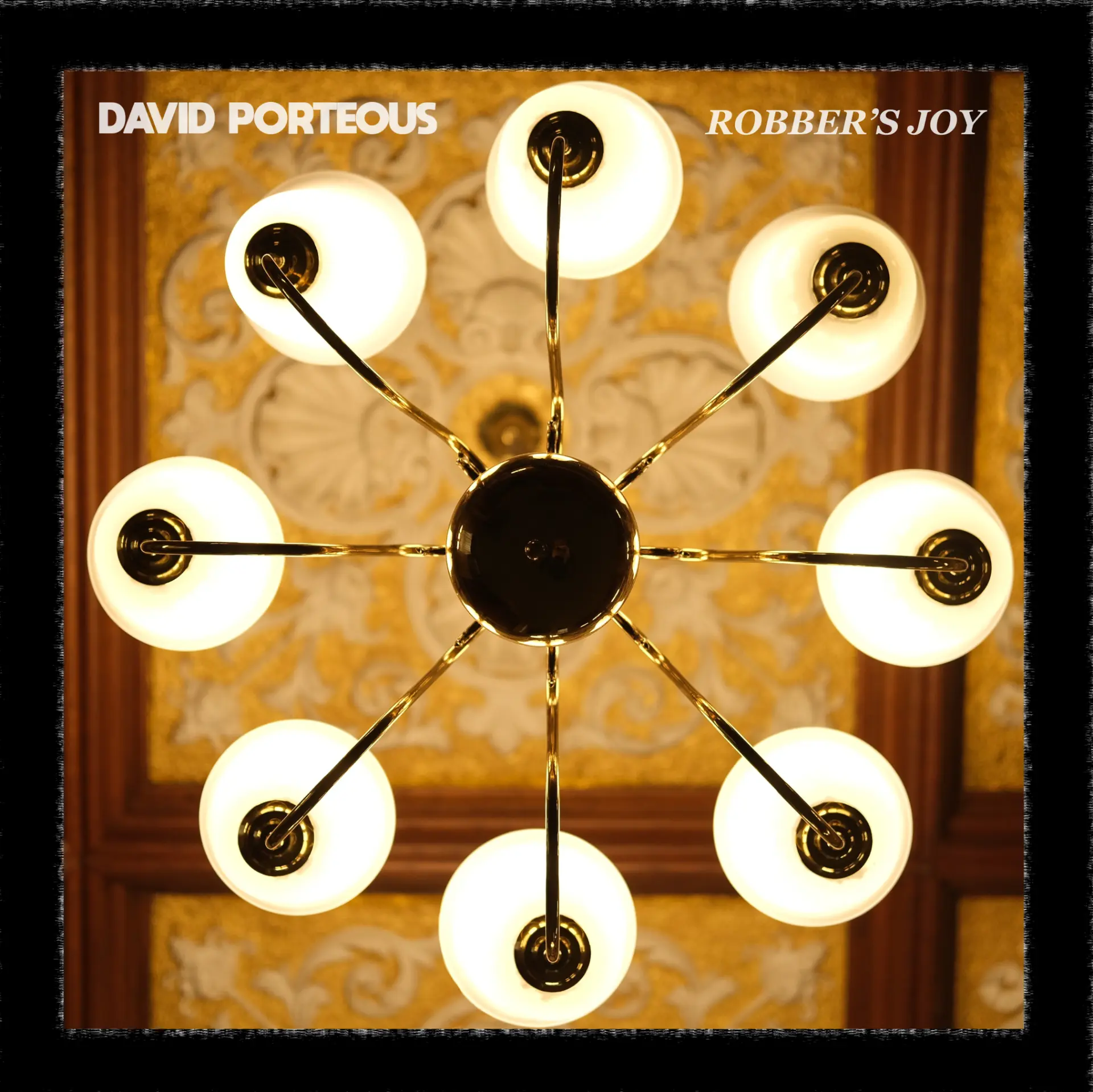 Robber's Joy album cover — a brass chandelier with glowing globes
