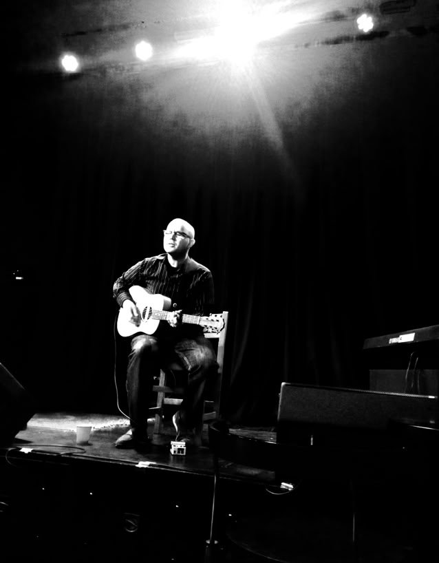 David Porteous performing solo on stage
